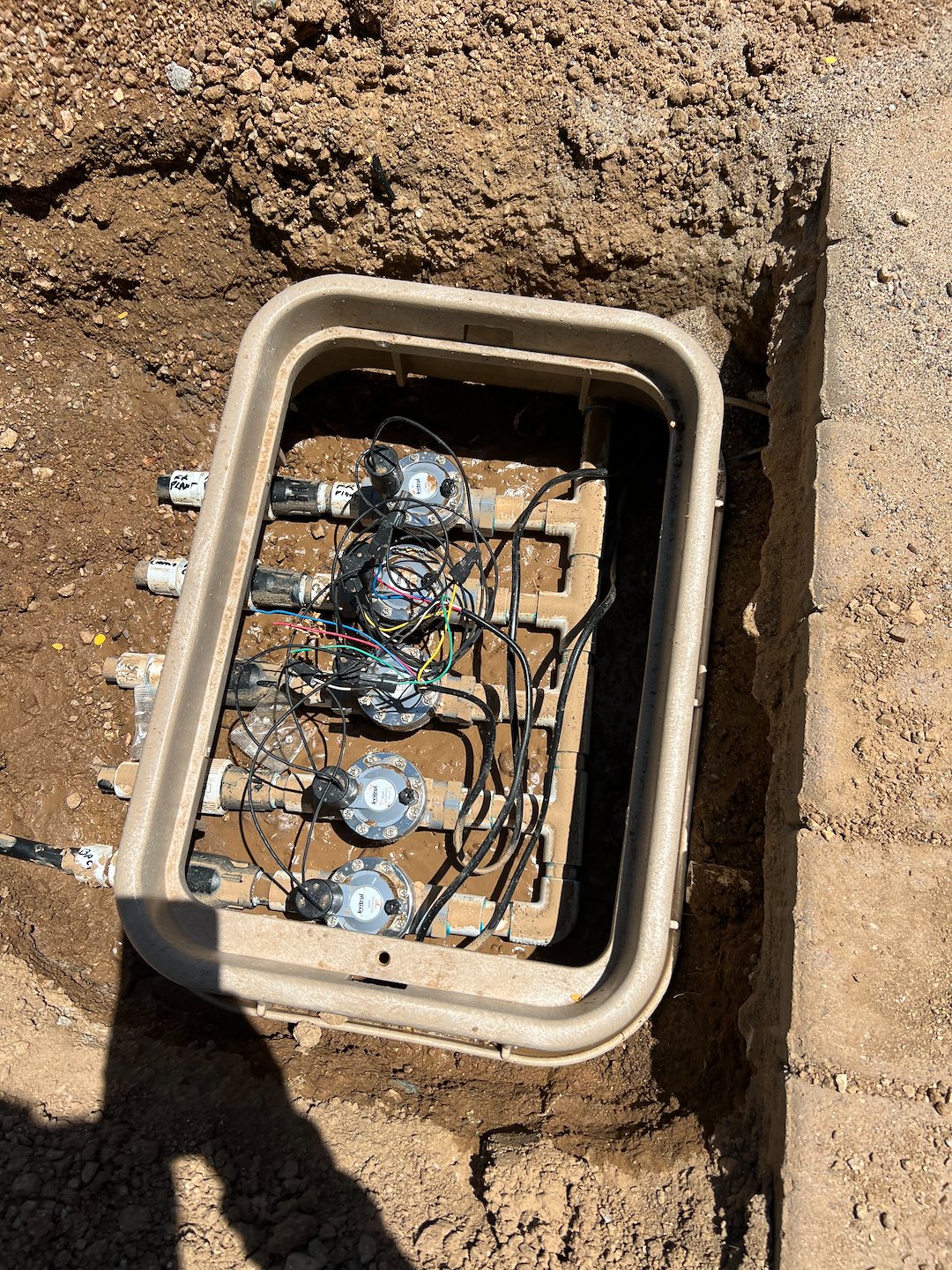 Professional valve manifold irrigation installation in Care Free
